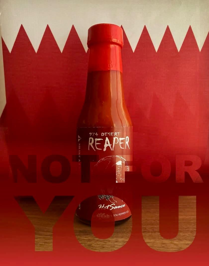 974 Desert Reaper hot sauce bottle against red background with bold NOT FOR YOU text.